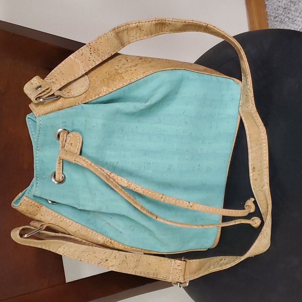 Tie top bucket bag made Artelusa from Portuguese cork.  Water green in color